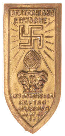1929 NSDAP Schwäbischer Gautag Augsburg event badge with Deutschland Erwache motto, brass tinnie with swastika and oak-cone emblem, original pin