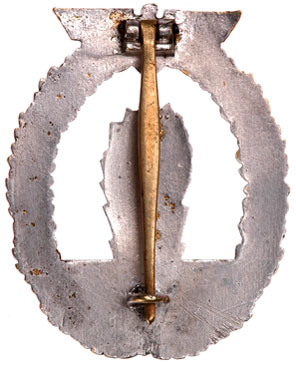 three large and numerous small spots missing nickel plating on back